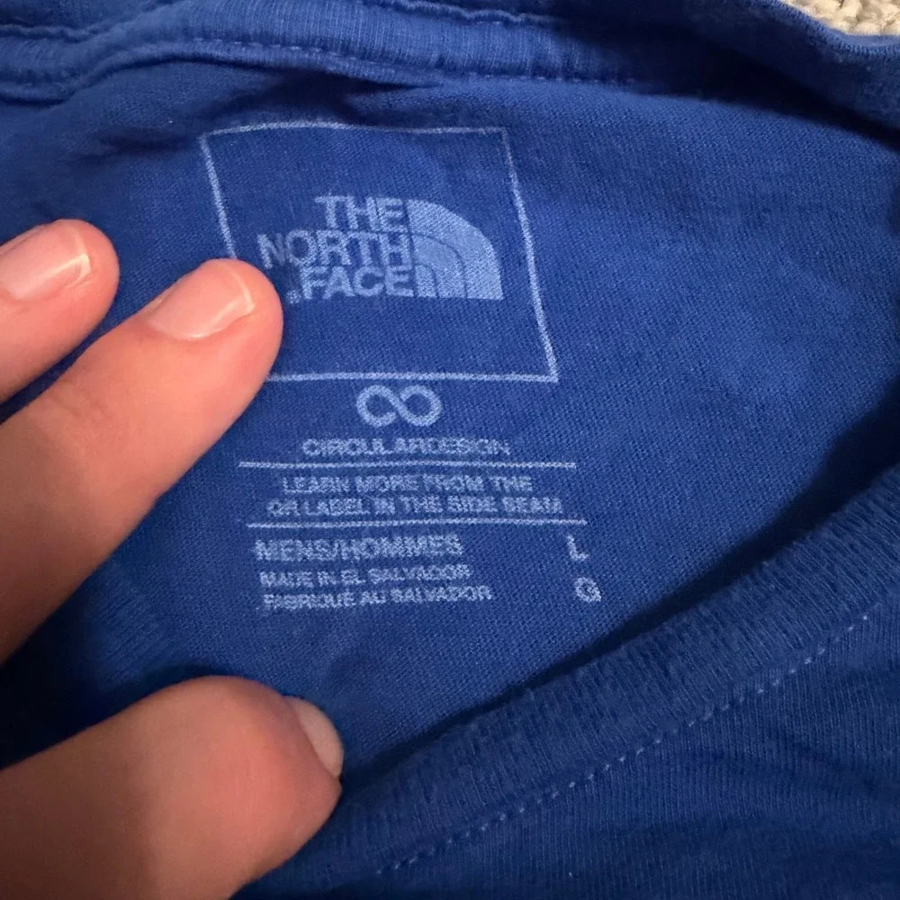 The North Face Mens Royal Blue Graphic Logo T-Shirt Size Large Circular Design